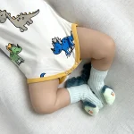 【66-90cm】 帽子付き 恐竜プリント ロンパース - 画像 (6)